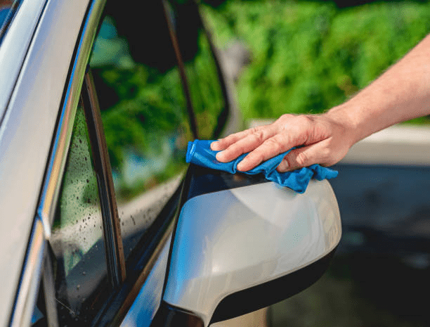 cleaning car mirrors